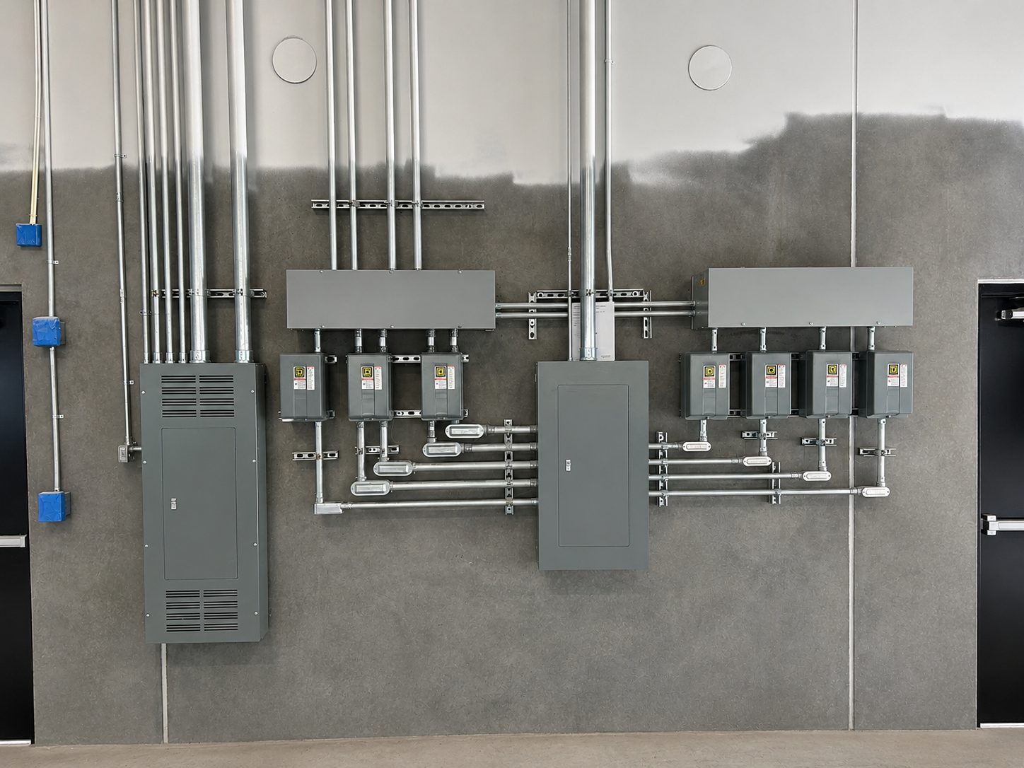 Commercial electrical panel and conduit installation