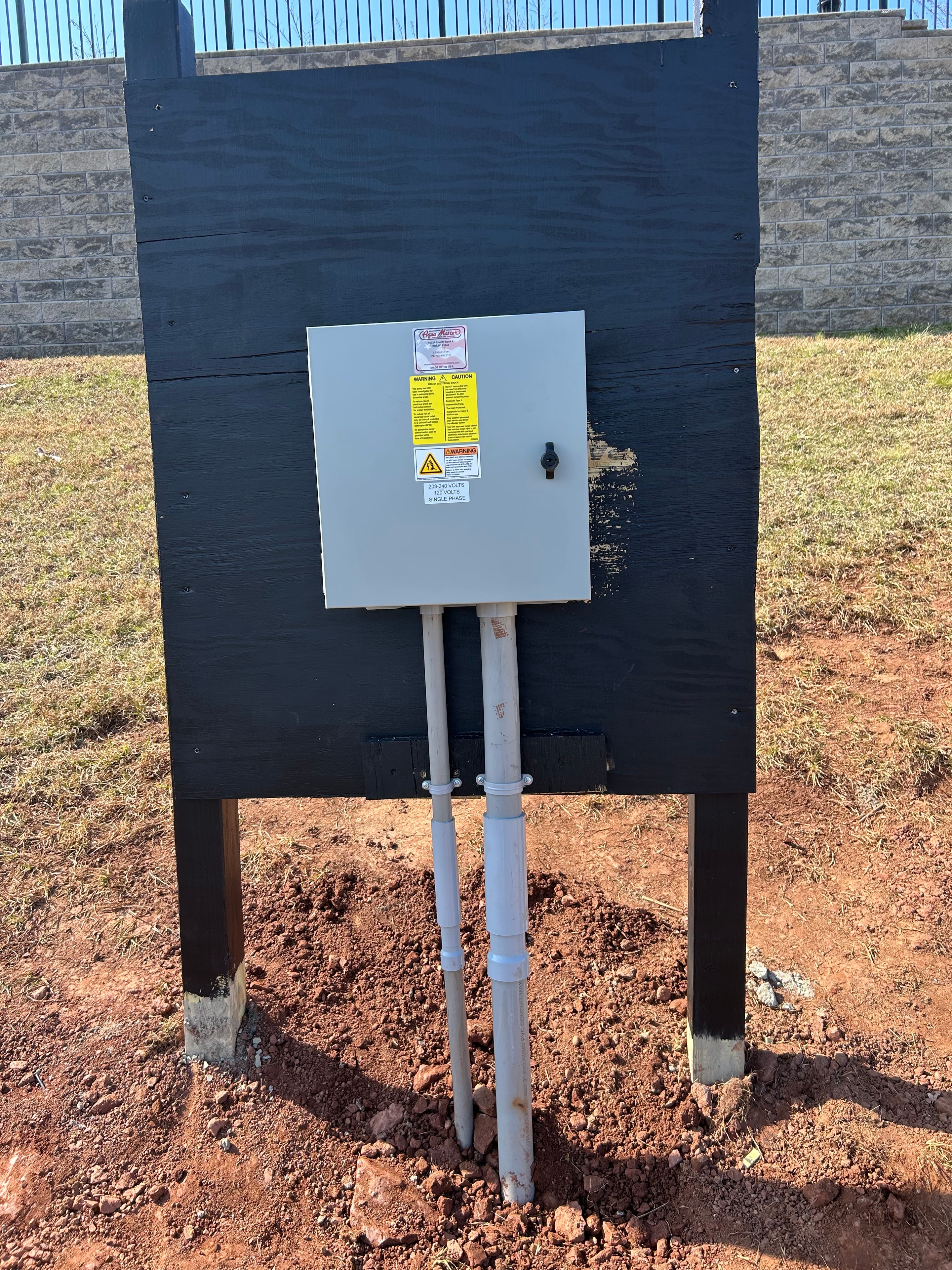 Villas at Montgomery outdoor pond pump electrical enclosure installation